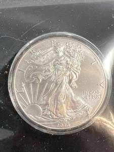 lot 91 image: 2013 AMERICAN SILVER EAGLE WITH CERTIFICATE UNC