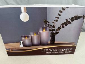 lot 79 image: New 3 Piece Set of LED Wax Flameless Candles with Remote