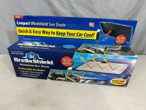 lot 279 image: New Brella Shield Compact Windshield Sun Shade