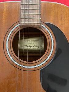 lot 147 image: HARMONY GUITAR AND AMIGO GUITAR WITH CASE.