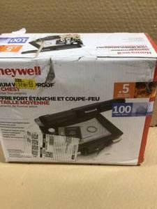 Honeywell 0.24 cu. ft. Molded Fire Resistant and Waterproof Portable Chest with Carry Handle, Key and Double Latch Lock  Customer Returns See Pictures