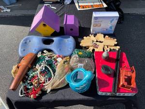 lot 18 image: Outdoor Gardening, Light Bulbs, Bird House, Gun Holster, Costume Jewelry Necklaces, etc.