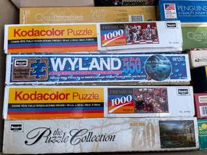 lot 52 image: Twelve Puzzles with Dart Board (piece counts unverified)