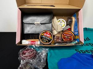 lot 246 image: Coach Pattern (tag Inside but unverified) Blue VTG Bag, Womens T-Shirts Various Szs, Sweat Pants & Shoe Shine Kit