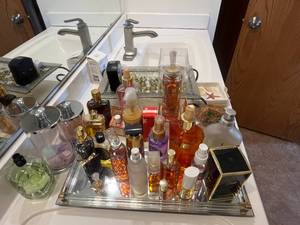 lot 250 image: Used Fragrances w Tray, Night Lights, Decorative Stone, Tropical Soap Dish, Covered Pottery Dish &  More