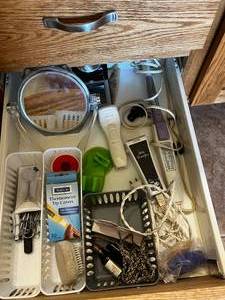 lot 251 image: Contents of Bath Drawer Inc VTG Norelco Curling Iron, VTG Lady Remington Electric Razor, Panasonic Smooth Operator (untested) and More