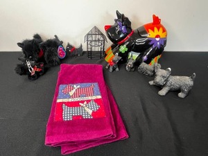 lot 259 image: Lot of Scotty Dog Decorations Inc Cookie Jar, 2 Hand Towels, Figurines, Key Chain & More