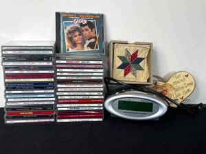 lot 268 image: Lot of 37 CDs, Timex Digital Clock (works), Coasters and Dog Plaque