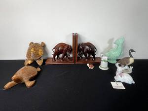 lot 270 image: Wooden Elephant Bookends, 2 Wooden Turtles, Mini Tortoise, Lamb Bell, Fish Avon Foaming Bath (empty), Deer Figurine