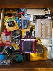 lot 332 image: Drawer Contents Inc Furniture Sliders, Screws, Magic Putty, Plug In Adapters, Etc