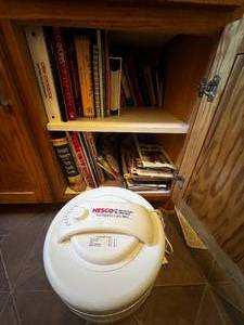 lot 334 image: Cupboard Contents Inc Cook Books & Food Dehydrator