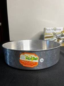 lot 343 image: Pasta Machine Bed Bath & Beyond, Presto TaterTwister & Round 12 Cake Pan