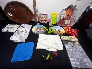 lot 305 image: 2 Football Plastic Trays, Alf Cake Pan, Flamingo Salt & Pepper Shakers, Mini Salt & Pepper Shakers in Box, Kitchen Towels w Tags, Misc Linens, (2) 1988 Mallards at Sunrise Plates by Lynn Kaatz & More