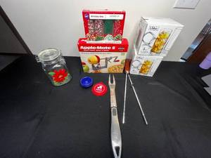lot 315 image: Bell Jar w Poinsetta Painted on Front, 2 Boxes of Libbey 4 pc Cabos Cooler Glasses, Apple Parer, Corer & Slicer, Grill Utensils & More