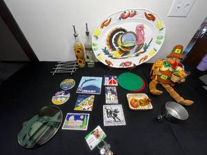 lot 317 image: 18.5 Turkey Platter, Animated Turkey Decoration, Fall Decoration Salt & Pepper, Assortment of Trivets, Sharpei Key Chain &  More