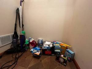 lot 328 image: Cleaning Closet Contents Inc Steam Mop, Eureka Electric Mop, Swiffer, Cat Litter Liner Pkgs (8), Two Swiffer Cleaners, Stain Remover, Swiffer Duster & Refills, Etc