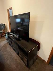 lot 99 image: 55 LG TV (Works) w Fireplace Entertainment Stand That Gives off Heat (Works & Has Remote) and DVR (Powers Up No Remote)