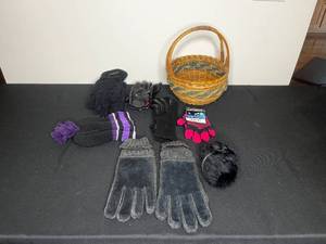 lot 103 image: Lot of Winter Wear Inc 5 Pairs of Gloves (some unisex), Hat w Tassel, Earmuffs & Basket