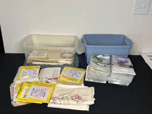 lot 412 image: Rolls of DMC FlossThread, Misc Cotton Fabric, Various Hot Iron Transfers, Counted Cross Stitch, Misc Cross Stitch Supplies