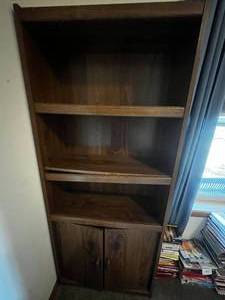 lot 437 image: Dark Wood 5 Shelf Bookshelf (lip of shelf is falling offdamaged), Narrow Cabinet with 3 Shelves and 2 Drawers (wobbly), Cabinet with Lower Drawer (Very damaged. Drawers off tracks, backing is off, shelving not secure, door is not on correctly, wobbly)