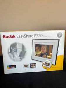 lot 105 image: Canon Selphy CP740 Photo Printer, Kodak Easy Share P720 7 Digital Frame, Photo Paper