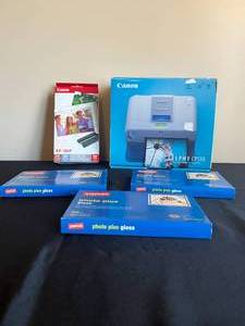 lot 106 image: Canon Selphy CP510 Photo Printer, Canon Color Ink  Paper Set KP36IP, Gloss Photo Paper