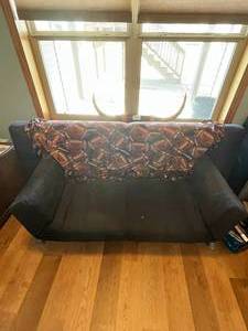 lot 131 image: Futon with Football Blanket - 70