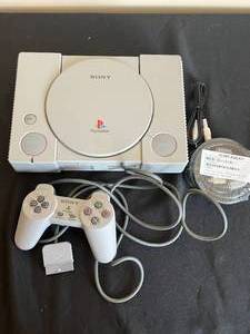 lot 163 image: PlayStation 1 with 1 Controller - missing power cord and TV connector cord - untested and HiDef Add Kit