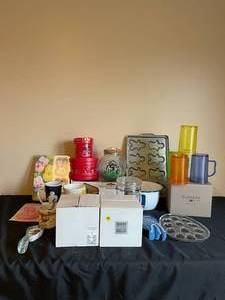 lot 379 image: Kitchenware - Molds  Cups  Recipe Box  Salt and Pepper Shakers  Mugs  Jar  Water Goblets