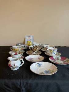 lot 384 image: VTG Tea Cups  Saucers  Table Cloth Weights  Candle Holders
