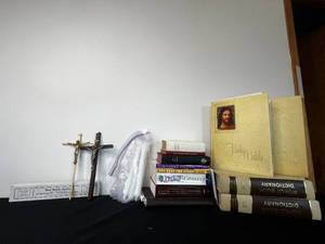 lot 260 image: Lot of Religious Memorabila Inc 2 Crosses, Blessed Candles, 7 Books & World Dictionaries & Beautiful Bibles