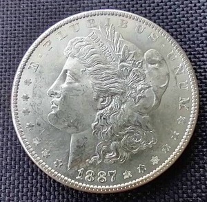lot 6 image: Nice 1887 Morgan Dollar