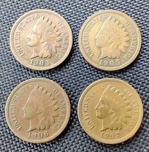 lot 29 image: (4) Indian Head Pennies