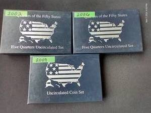lot 91 image: (3) Uncirculated Quarter Sets - 2002, 2006 & 2009