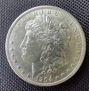 lot 99 image: 1904-O Morgan Dollar