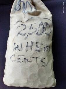 lot 122 image: Bank Bag of 2,500 Wheat Pennies