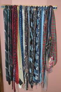 Collection of Colorful Ties and Ornate Bolo Ties