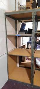 Metal Storage Rack with fiberboard shelves. Measures approx 96 H x 36 D X 36 W