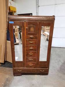 Vintage Wardrobe with 6 center drawers and 1 full-width lower drawer. On wheels. 42 w x 22 D x 69 H