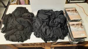 (12) E-Tex Tablecloths, new, 90 x 132. (14) Used elastic table covers. (6) used fabric table covers