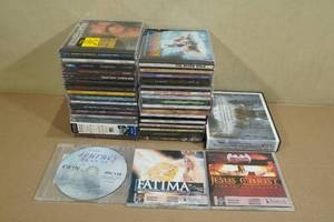 Large Assortment of CDs -Christmas, Disney, Santana