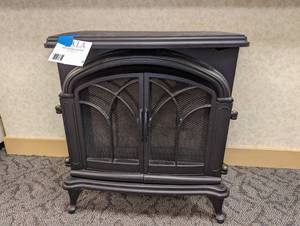 Fire and Sun retro wood stove style space  heater. Tested and works, will require one replacement light bulb)