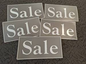 Collection of Sturdy yet pliable plastic swinging Sale signs