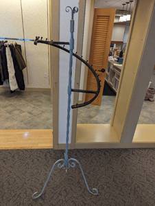 Wrought-iron coat rack style cascading retail display