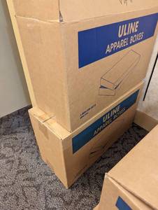 Full and near full cases of Large suit 24 x 14 x 4 boxes