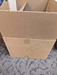 Partial case of 19 x 12 x 3 sweater boxes
