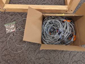 Large assortment of coated eyelet end retail cable with locks and keys
