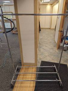 Metal framed rolling wardrobe rack