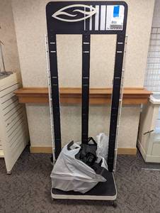 Metal framed and spinning Smith branded retail display with hanger accessories