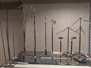 Assortment of stainless steel style retail holders, hangers and displays
